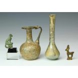 Two Roman glass flask, one flask with a handle, 2nd/3th century, and two antique bronze animal
