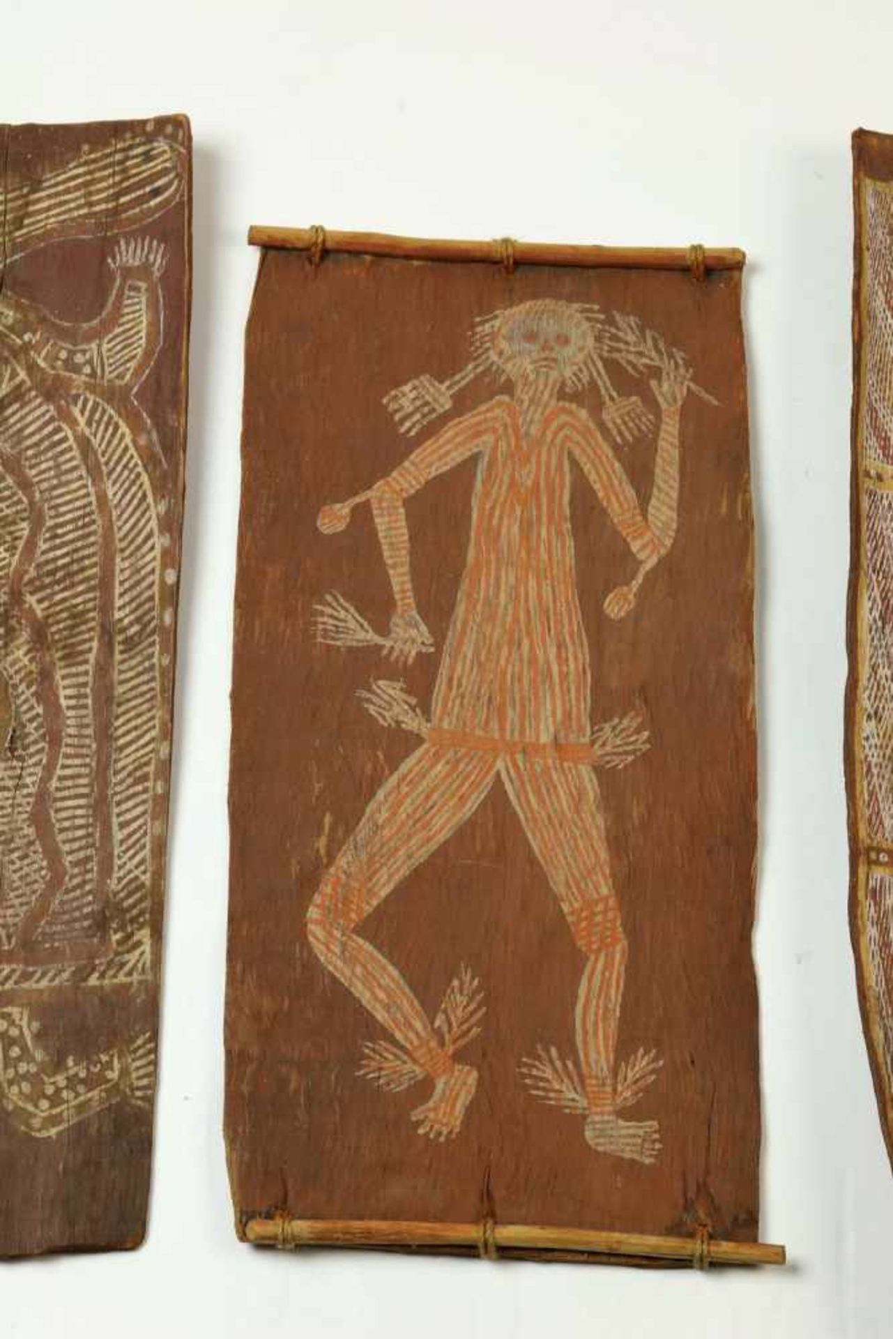Australia, three Aboriginal bark paintings,one with titel 'Lightning Man', one with ancestral turtle