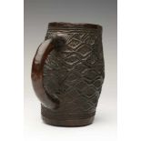 DRC., Kuba Kingdom, old carved wooden palm wine cup,with carved geometrical patterns and black brown