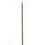 Papua Barat, Teluk Cenderawasih, carved wooden spear, ca. 1900decorated with carved standing