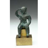 Antique bronze statue of a seated figure, possibly Roman.with on hand to his right temple.; h. 6,5