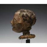 Nigeria, Ekoi-Enjagham, cephalomorphic headdress;a human skull bound with animal leather, human hair