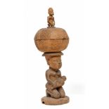 Benin, Fon, carved wooden ceremonial lidded box,with seated maternity as the support, the lidded box