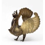 Java, brass wajang lamp, belencong,shaped as a Garuda; h. 37 cm.; 1800