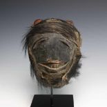 Nigeria, Ibibio-Ogoni, face maskin the form of animal head with articulated mouth, two carved