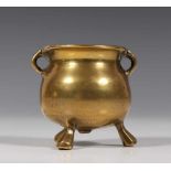 Bronzen miniatuur koopkpot ofwel grape, mogelijk 17e eeuw,op driepoot; h. 7 cm.; 1100