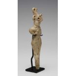 Syrie, terracotta idol, Hama type, 2nd Mill BC.,with six perforations in the hairdress, arms