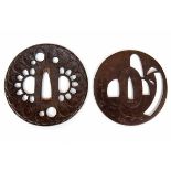 Japan, twee tsuba's, Edo periode,een ajour met in reliëf een bloesemtak, gesigneerd Choshi Hagirju