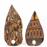 PNG, Abelam, two painted wooden headdresses, wakan,both of leaf-shaped, one with stylized