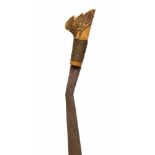 Borneo, Dayak, sword with finely carved bone handle, ca. 1900with floral motifs in relief. Private