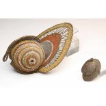 PNG, Abelam, two plaited rattan yam masksone with bulbous face, the other a miniature item. With