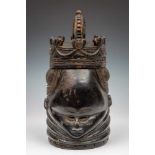 Sierra Leone, Mende, anthropomorphic female mask, soweirare mask with a carved English crown on