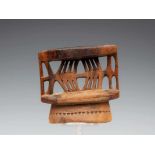 PNG, Collingwood Bay, wooden headrestProvenance: Michael Evans; w. 15 cm; 1400