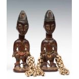 Nigeria, pair of male Yoruba Ibeji figure,with hairstyle in four upright braids, many beaded