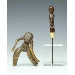 Indonesia, two objects, an implement topped by a female figure and a bamboo figurel 18,2 and 10,8