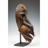 Liberia, Loma or Kpelle, face maskWith protruding beak, three wrought iron pins, circular eyes,