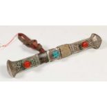 Tibet, Dughti knife, 19th century. Silver, steel, horn, leather, snake skin, turquoise and