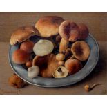 Jan Voerman jr. (1890-1976)Paddenstoelen op een tinnen schotel; board; 19 x 23 cm.; gesign. l.o., '