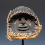 New-Hebrides, Vanuatu, rare painted wooden face mask,with overhanging forehead, round cut eyes,