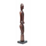 Ivory Coast, Senufo, wooden anthropomorphic figure-stamper, debleWith slightly tilded head, face