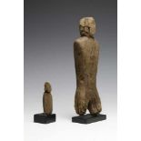 Arctic Circle, Thule Culture, two driftwood anthropomorphic figuresProvenance, auction of Lord