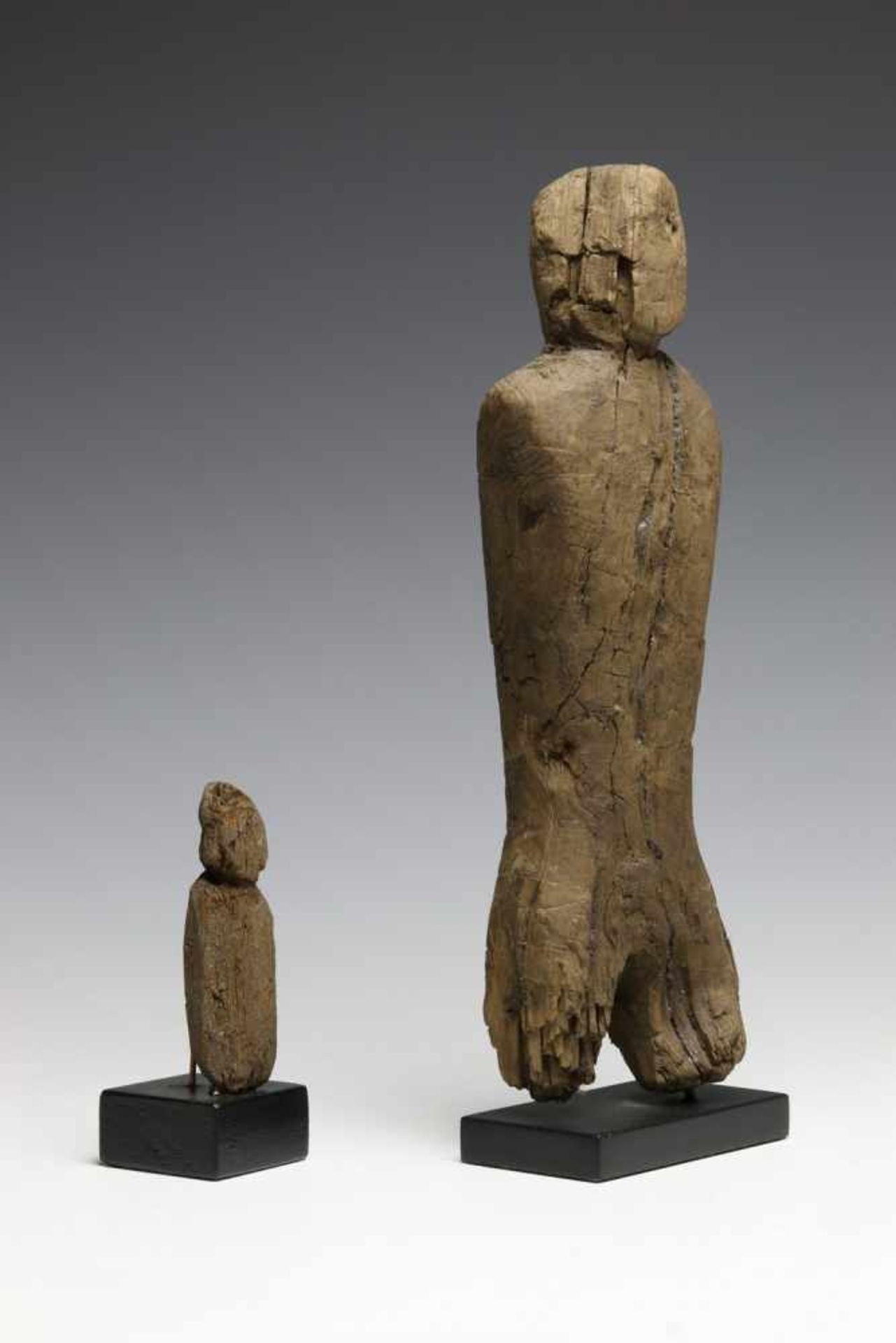 Arctic Circle, Thule Culture, two driftwood anthropomorphic figuresProvenance, auction of Lord