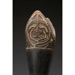 PNG, Papua Gulf, hourglass-shaped drum, with two panels of spirit figures at the baseacents of