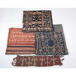 Sumba, a collecten of three ikat cloths and one ikat belt clothvarious stylized floral motifs and