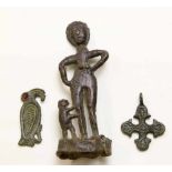 Bronze bird amulet, Frankish 3rd-9th century and Dutch led-tin pilgrims figure, ca. 15th century.