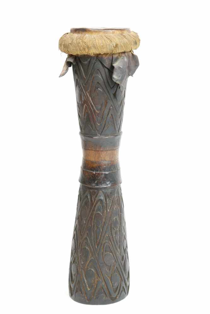 Papua Barat, Sentani, wooden drum, hourglass shaped,with curved linear design, original leather