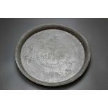 Java, ceremonial dish, talam, ca. 14th-15th century,the interior decorated with a incised flower