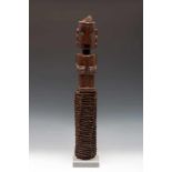 Sumatra, Toba Batak, protective figure, pangulubalang,a wooden cilinder bound with plaited plant