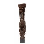 PNG, carved fern-tree statuetwo figures on top of each other, cowrie inlayed eyesProvenance: old