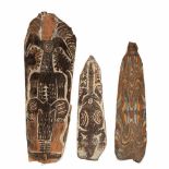 PNG, Middle Sepik, Kambot, three painted sago spath wall decorationswith zoomorph and anthropomorf