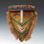 New Britain, Gazelle Peninsula, Tolai, ceremonial mask, Lorpainted in green, blue, red and white,