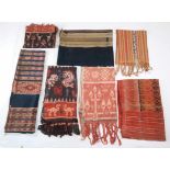Indonesia, a collection of eleven Ikat textiles,some damaged, worn or faded, retrieved from a