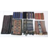 Indonesia, a collection of nine Ikat textilesvarious designs, some damaged, worn or faded, retrieved