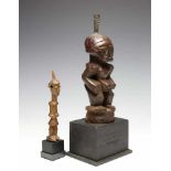 DRC, Songhe and Lulua, two wooden power figuresl. 13,5 and 21 cm.; 2400