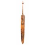 PNG, Sepik, large ceremonial wooden peddledecorated on one side with an ancestral carved head and