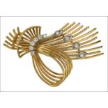 An 18ct gold and diamond spray brooch, 1950s, the stylised wirework spray accented with small