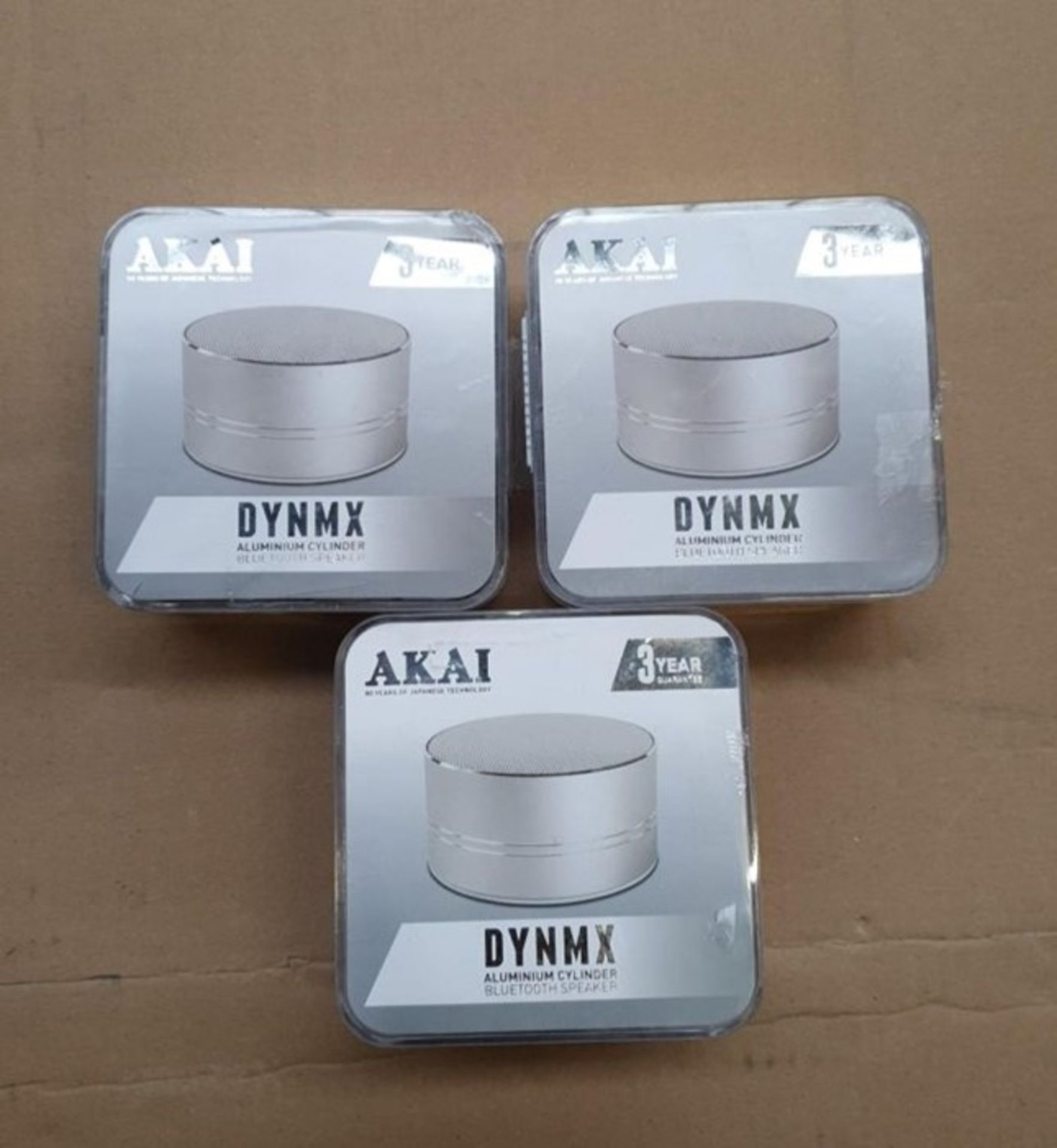 1 LOT TO CONTAIN 3 AKAI DYNMX ALUMINIUM CYLINDER BLUETOOTH SPEAKERS SILVER / BL -5615 / RRP £45.