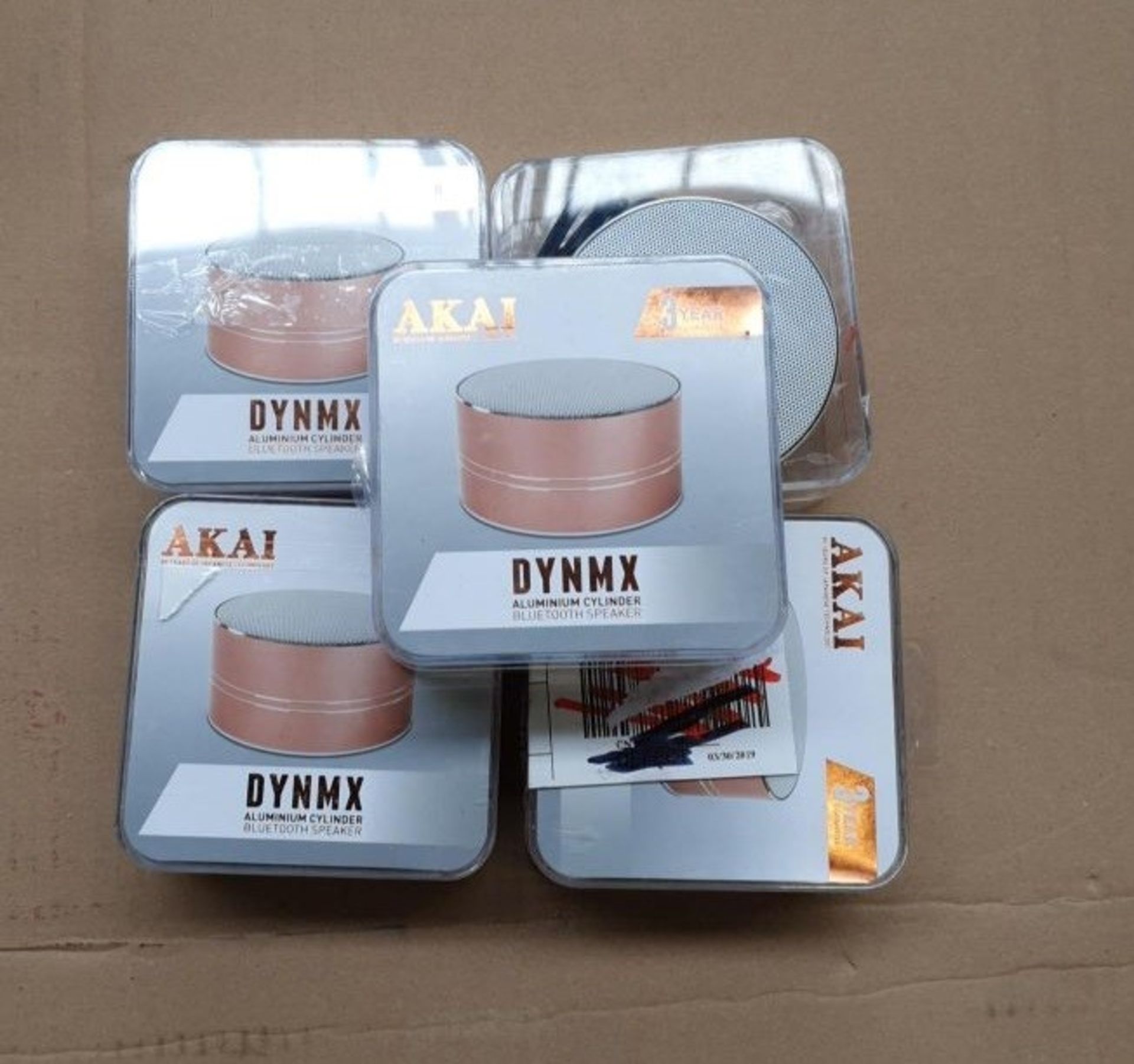 1 LOT TO CONTAIN 5 AKAI DYNMX ALUMINIUM CYLINDER BLUETOOTH SPEAKERS ROSE GOLD / BL -5615 / RRP £75.