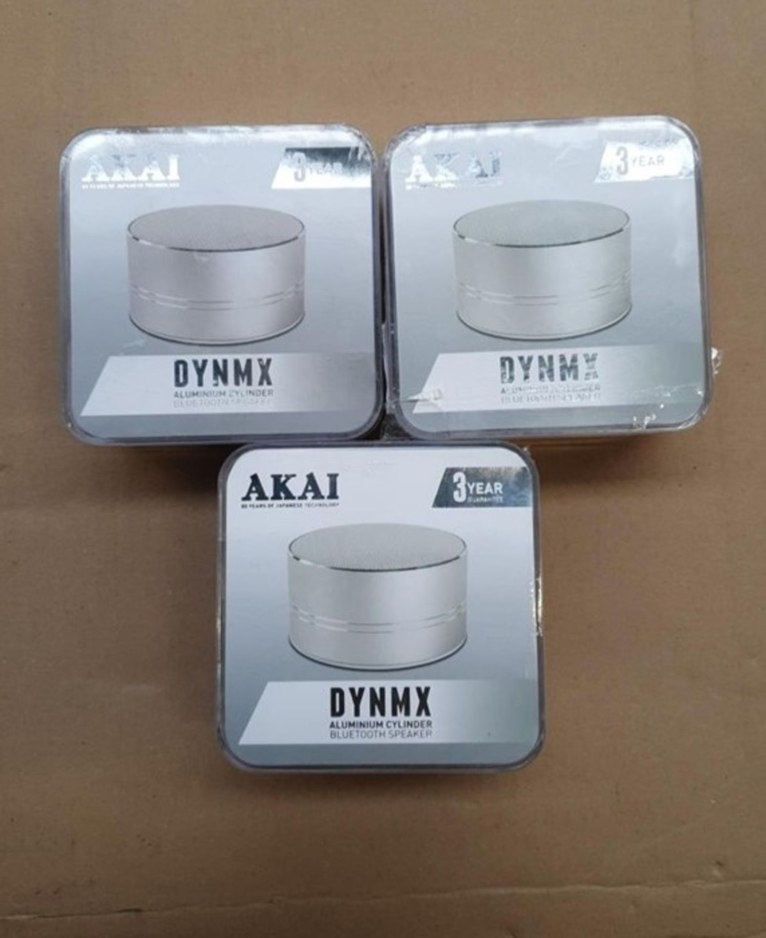 1 LOT TO CONTAIN 3 AKAI DYNMX ALUMINIUM CYLINDER BLUETOOTH SPEAKERS SILVER / BL -5615 / RRP £45.
