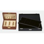 AUFBEWAHRUNGSBOXENTwo horizontal leather and green velvet fitted boxes, one for six gentleman's