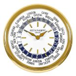 PATEK PHILIPPEWall clock "World Time".Manufacturer/Manufaktur: Patek Philippe, Geneva. Model: "World