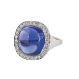 TANSANIT-DIAMANT-RINGAtraktiver Weissgold-Ring 18 kt. Als Blickfang 1 Tansanit-Cabochon von ca. 11,