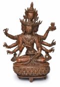 Avalokiteshvara, Tibet um 1920.Bronze, rotbraun patiniert. Bodhisattva m. 4 Köpfen u. 8 Armen. Im