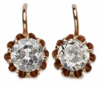 Paar Ohrringe, RG, besetzt mit 2 Altschliff-Diamanten v. zus. ca 1,50 ct