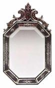 Kl. Murano-Spiegel, Italien um 1900.8-eckiger Holzrahmen, Spiegeleinsatz m. Facettenschliff, Rand in