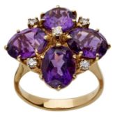 Damenring, 14 kt GG, besetzt mit 4 Amethysten im Ovalschliff und 5 Brillanten von je ca0,02 ct, D